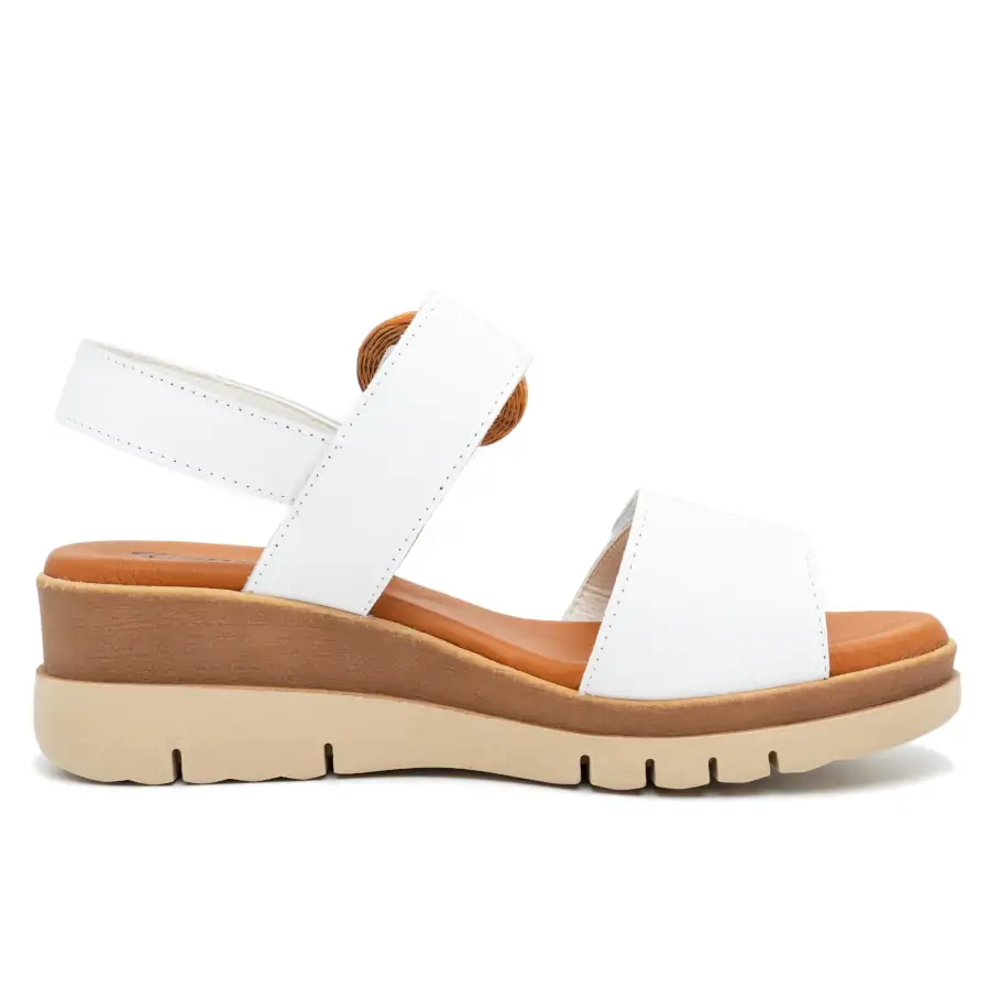 Dettaglio nappa bianca e suola in gomma del sandalo 592 Tomasi Shop
